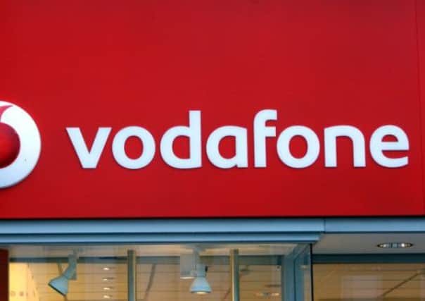 Vodafone has confirmed it is in talks over a deal that will see it exit the United States through one of the largest corporate transactions of all time.