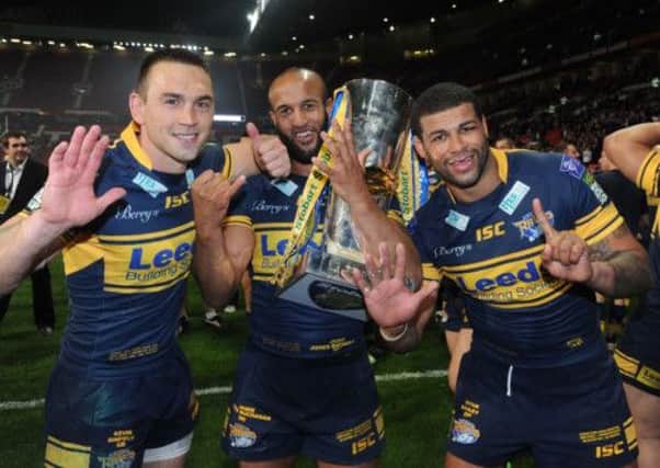TRIPLE BOOST: Jamie Jones-Buchanan, seen above with captain Kevin Sinfield, left, and team-mate Ryan Bailey, right, believes Leeds Rhinos will receive a significant play-off boost from the return of key players, including himself, Bailey and Danny McGuire. PICTURE: Steve Riding.