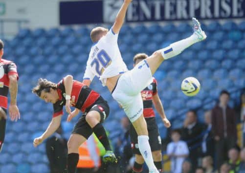 Matt Smith tangles with QPR player Joey Barton