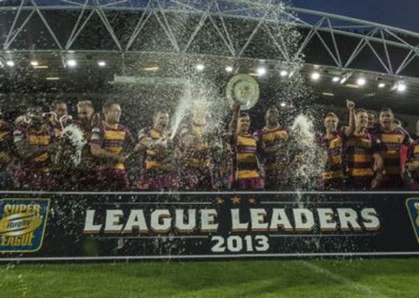 Huddersfield Giants celebrate winning the League Leaders' Shield.  Photo: Allan McKenzie