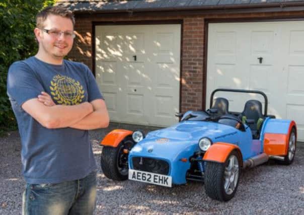 Jonathan Palgrave with his Tiger racing car.
