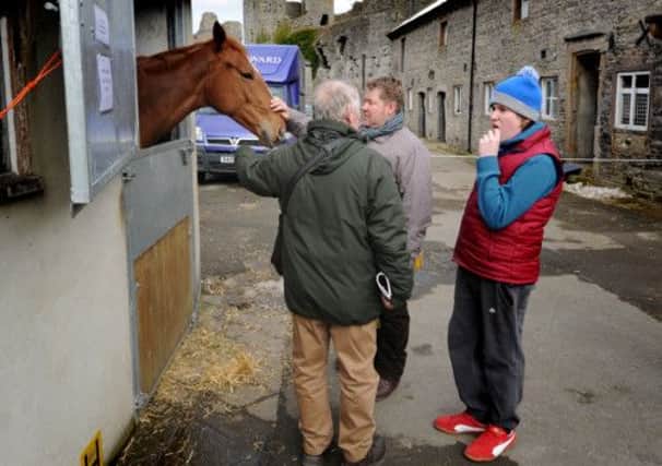 Visitors to the Jason Ward Stables in the shadow of Middleham Castle.