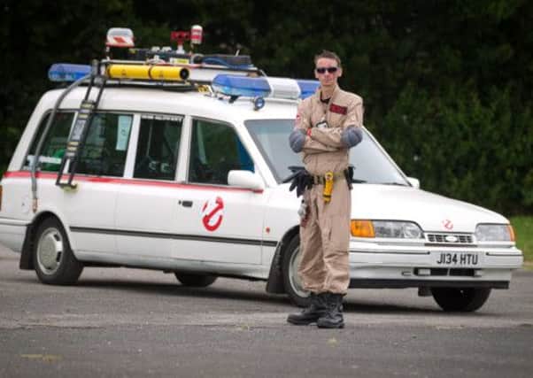 Craig Mitcheli with his Ford Granada Ghostbuster car. Picture: Ross Parry Agency