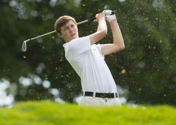 Matt Fitzpatrick watches his tee shot on the seventh hole during the final round of match play at the 2013 U.S. Amateur  (Picture: USGA/John Mummert)