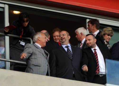 The new co-owner of Sheffield United Prince Abdullah, centre, with fellow co-owner Kevin McCabe, left.