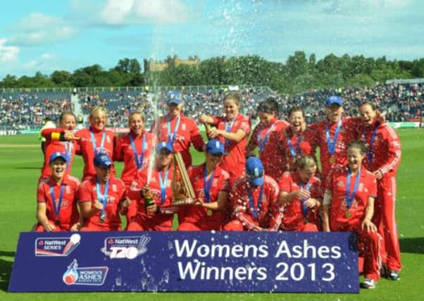 England women's team celebrate with the Ashes trophy