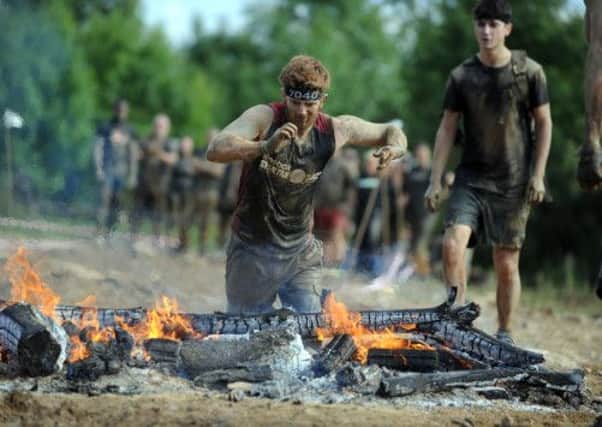 Lance Bombardier James Simpson becomes the first British double amputee to run a Spartan Race obsticle event