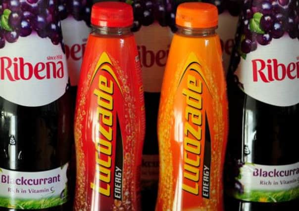 GlaxoSmithKline has agreed to sell the soft drinks brands for £1.35 billion to Orangina Schweppes owner Suntory.