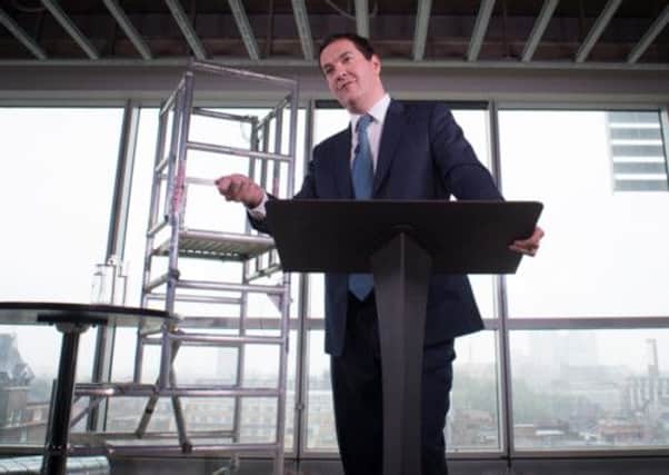 Chancellor of the Exchequer George Osborne makes a speech on the present state of the UK economy at a construction site of offices and 'affordable homes' in east London