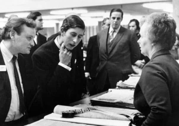 December 1970: 

Prince Charles, accompanied by John Edwards, Editor of the Yorkshire Post, talks with librarian Helen Went.