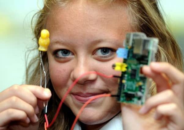 Elicia Darwent uses a jelly baby to control a Raspberry Pi computer