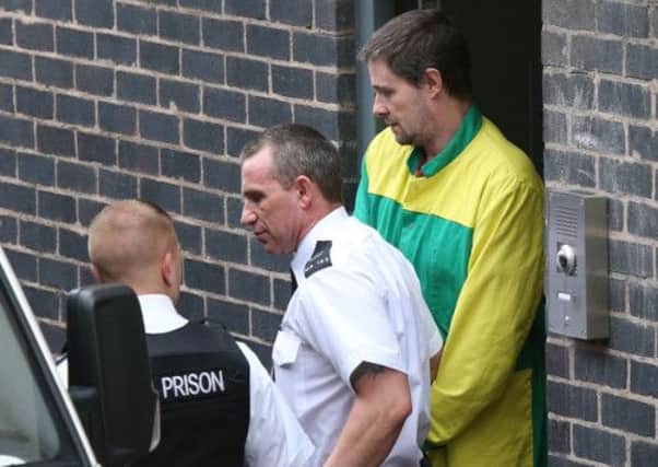 Mark Bridger leaves Mold Crown Court after he was given a whole life sentence for the abduction and murder of schoolgirl April Jones.