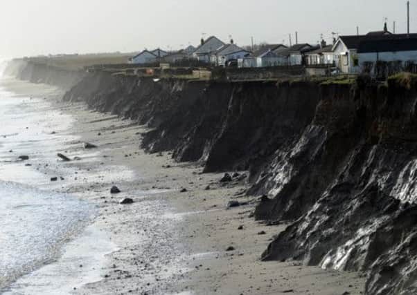 Homes under threat from coastal erosion at Skipsea on the Holderness coast.