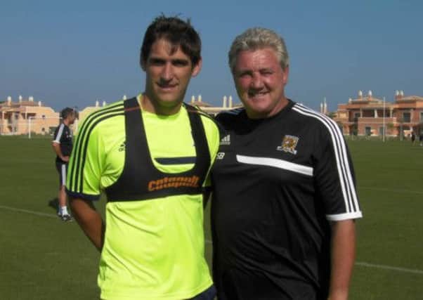 Danny Graham and Steve Bruce at Hull City's training base in Portugal