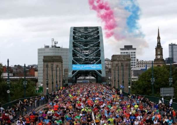 Athletes crossing the Tyne Bridge as they compete in the Great North Run in Newcastle.