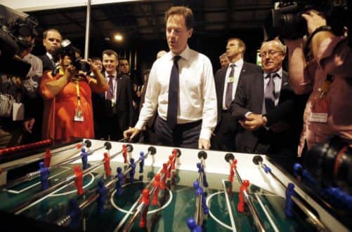 Liberal Democrats leader Nick Clegg plays table football during the Liberal Democrats' autumn conference in Glasgow