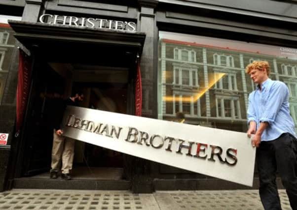 The main sign from the Lehman Brothers office is auctioned off