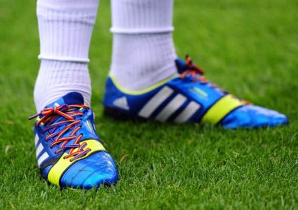 Queens Park Rangers' Joey Barton's rainbow boot laces during the Championship match at Loftus Road