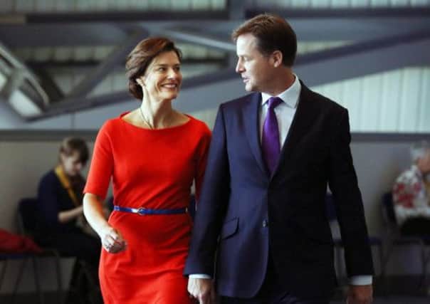 Liberal Democrat leader Nick Clegg arrives with wife Miriam  at the Liberal Democrat conference