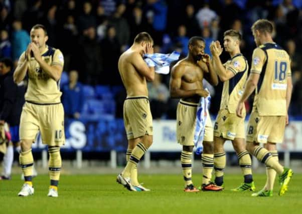 FRUSTRATION: Leeds players show their dismay after losing late at Reading. Picture: Jonathan Gawthorpe.