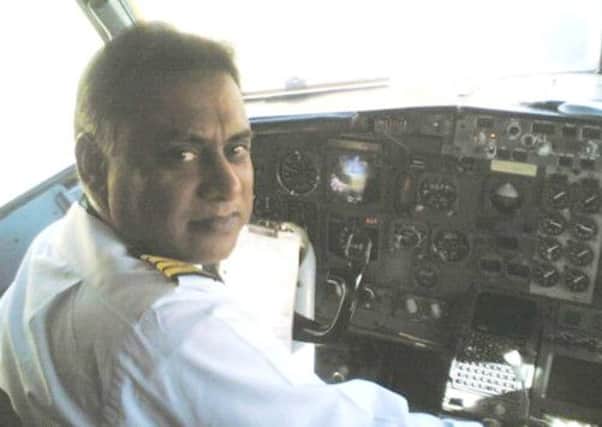 Capt. Irfan Faiz on the flight deck of a PIA Boeing 737-300. Picture: M Ali/historyofpia.com