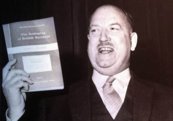 Dr Beeching holding his report