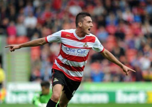 Doncaster's Federico Macheda celebrates the first of his two goals.