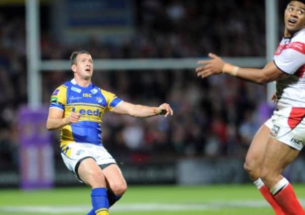 Danny McGuire watches as his late drop goal sails between the posts.
