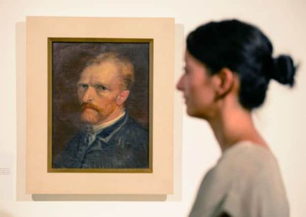 A visitor views  'Self Portrait December 1886-January 1887', by Vincent Van Gogh