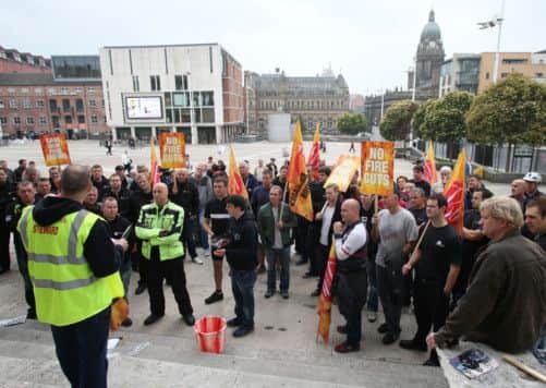 Firefighters and Fire Service staff from West Yorkshire gather in Milennium Square, Leeds
