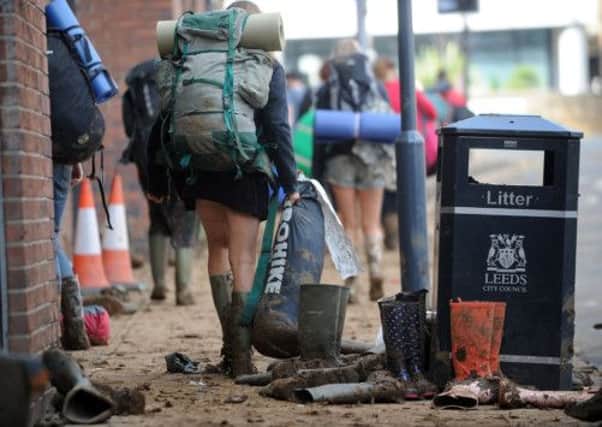 Festival goers arrive in Leeds from Bramham to catch the trains home in August