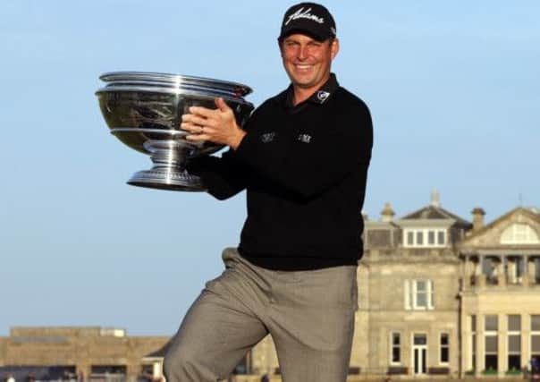 David Howell celebrates winning the 2013 Alfred Dunhill Links Championships at St Andrews Golf Course.