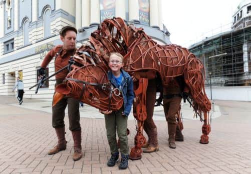 Daniel Nielsen, 11, from Barnsley, meets Joey, the life-size horse puppet from the National Theatres production