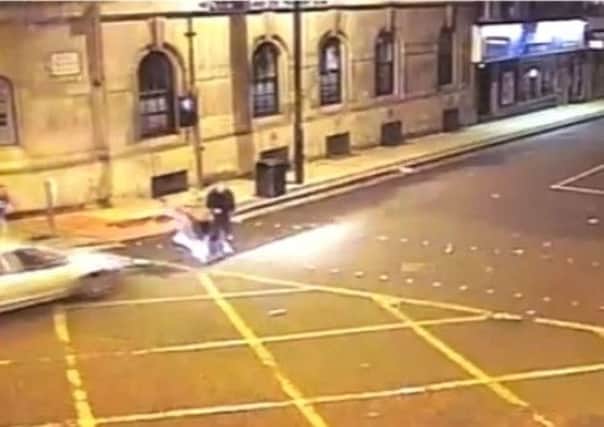 A car driven by Aqab Hussain ploughing into a group of men