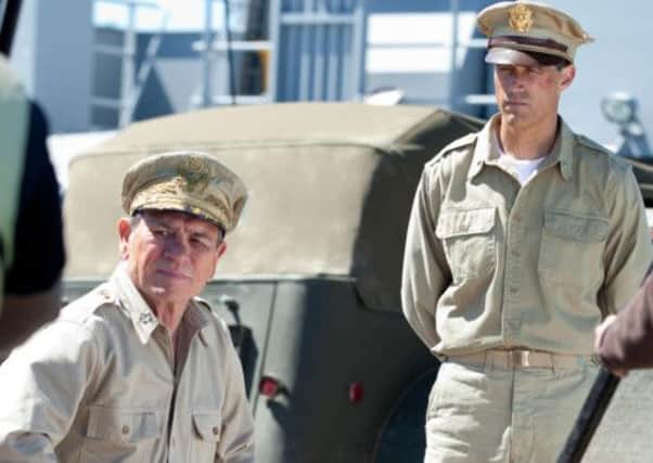 Tommy Lee Jones as General Douglas MacArthur and Matthew Fox as General Bonner Fellers