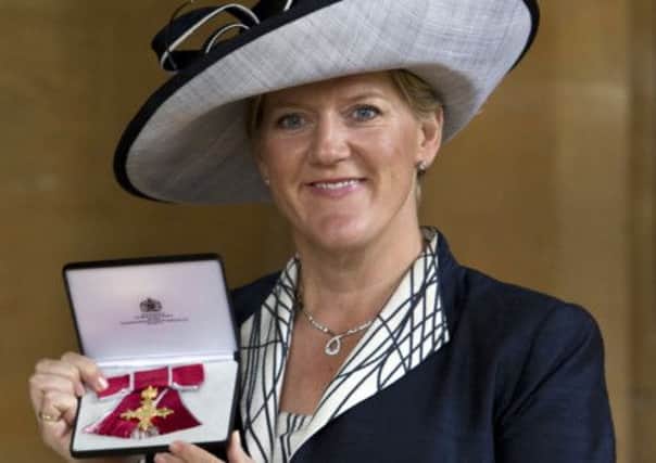 Claire Balding receives a OBE for services to Brodcasting and Journalism