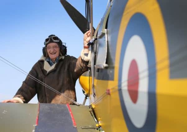 Fred Lamprey gets ready for his latest flight in a Tiger Moth at Netherthorpe Airfield near Worksop