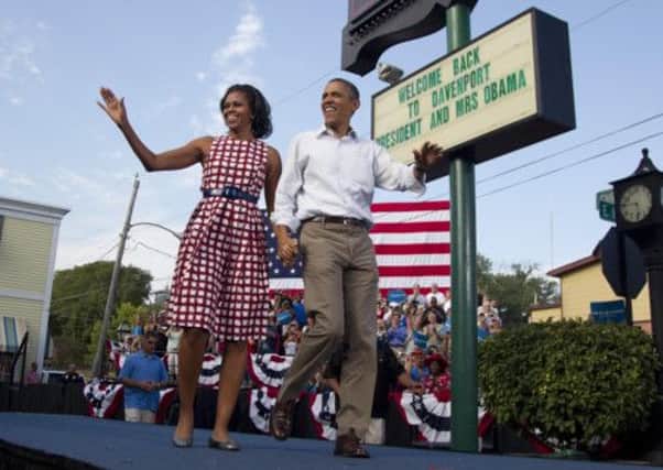 President Barack Obama and first lady Michelle Obama on the campaign trail