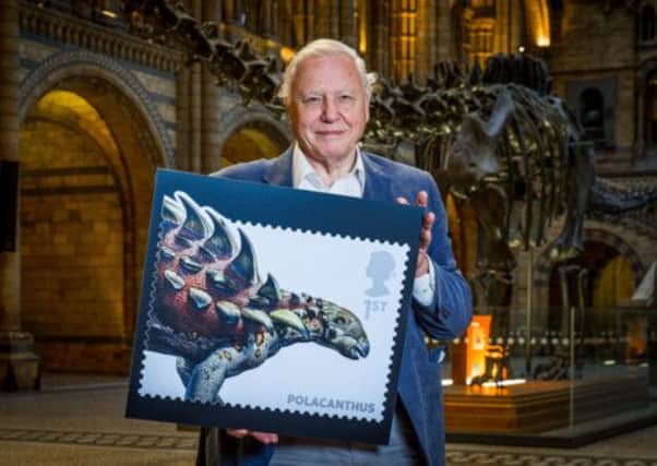Sir David 
Attenborough during the launch of the Royal Mail British Dinosaurs stamps
