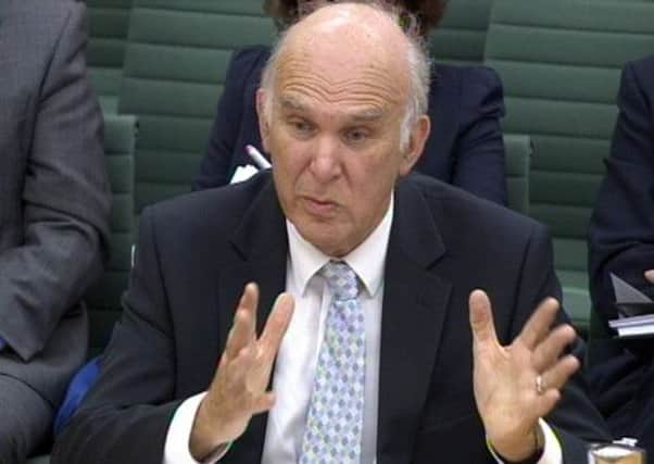 Business Secretary Vince Cable gives evidence on plans for the Royal Mail to a Business Select Committee at the House of Commons