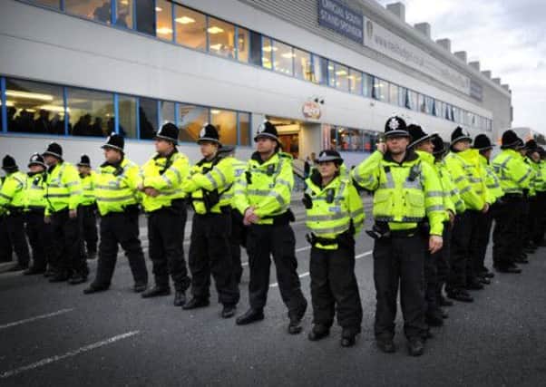Police keep Leeds and Manchester Utd fans apart last September