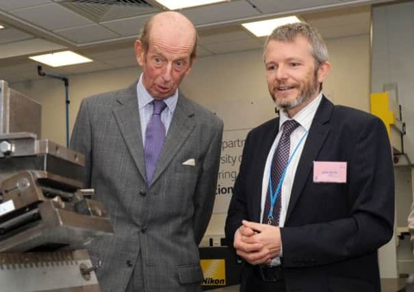 The Duke of Kent chats to Andy Morris in one of the labs at the 3M Buckley Innovation Centre, Huddersfield
