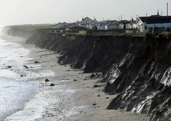 Homes under threat from coastal erosion at Skipsea on the Holderness coast