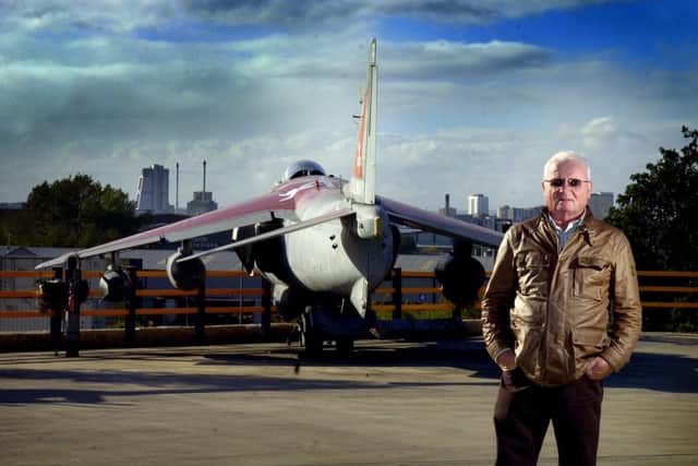 Jimi Heselden at his factory in Cross Green, Leeds, where he owned a decommissioned flighter plane, tank, military gun, and fire engine.