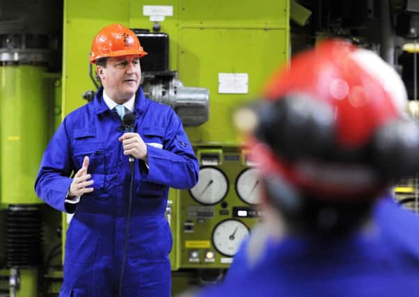 David Cameron delivers a speech to workers in the Charge Hall at Hinkley Point B in Somerset.