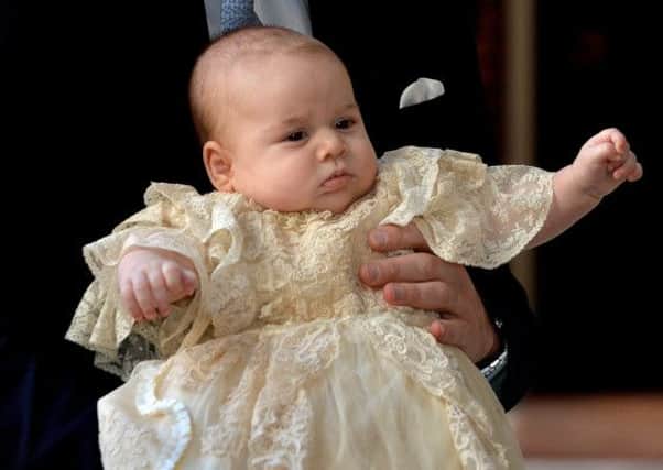 The Duke and Duchess of Cambridge as they arrive at Chapel Royal in St James's Palace, central London, with their son three month-old Prince George of Cambridge
