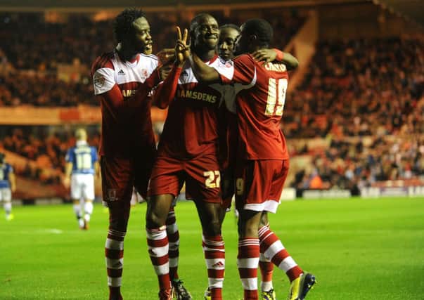 NICE ONE: Albert Adomah clebebrates his second goal with Kei Kamara and Mustapha Carayol. Picture: Bruce Rollinson.