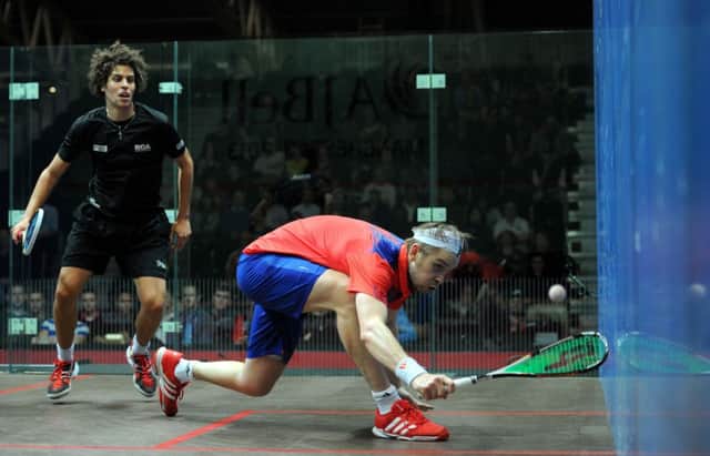 EARLY STRETCH: Pontefract's James Willstrop, right, in action against Derbyshire's Joel Hinds in their World Squash Championships first round encounter.