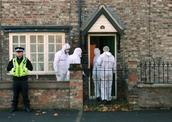 Forensic officers enter Claudia  Lawrence's house in Heworth,  York  yesterday