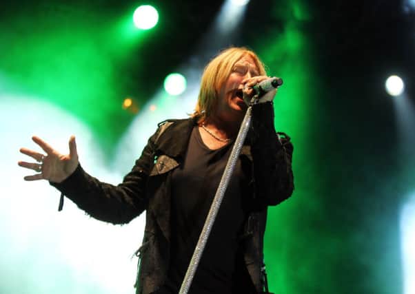 Joe Elliott performs with the band Def Leppard